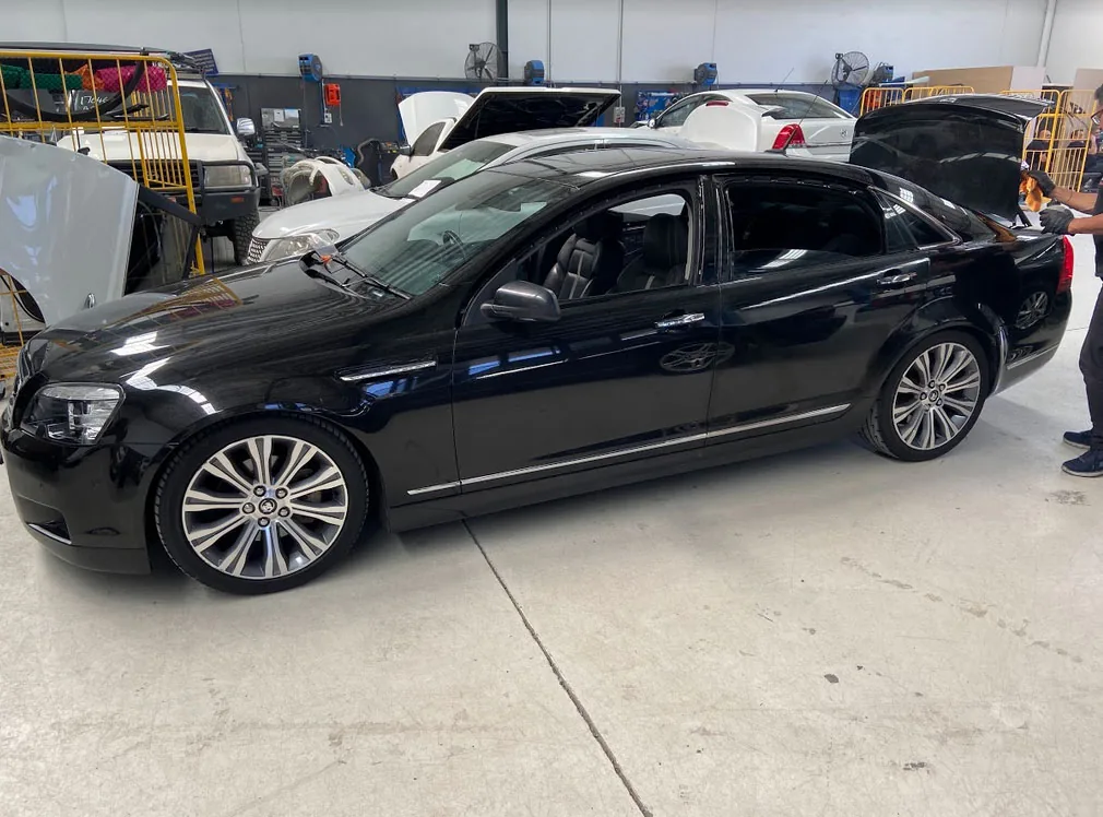 The sedan after full overspray removal