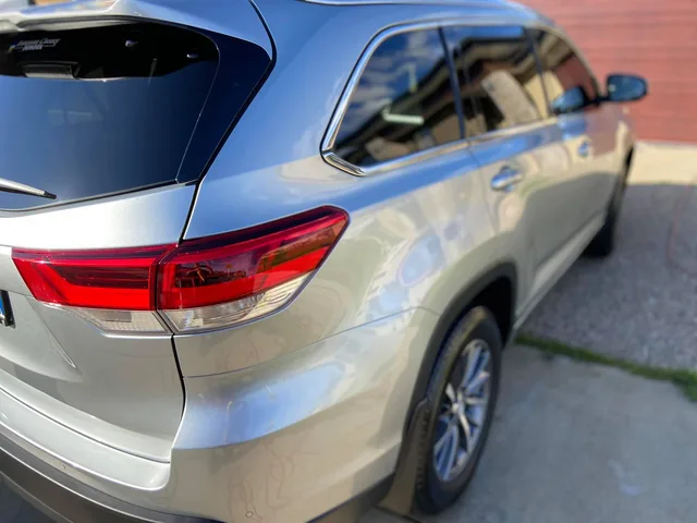 Silver Toyota Kluger rear after restoration
