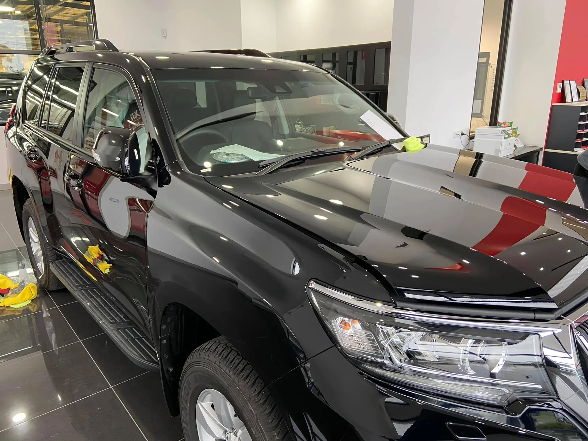 Black Toyota Landcruiser in the workshop